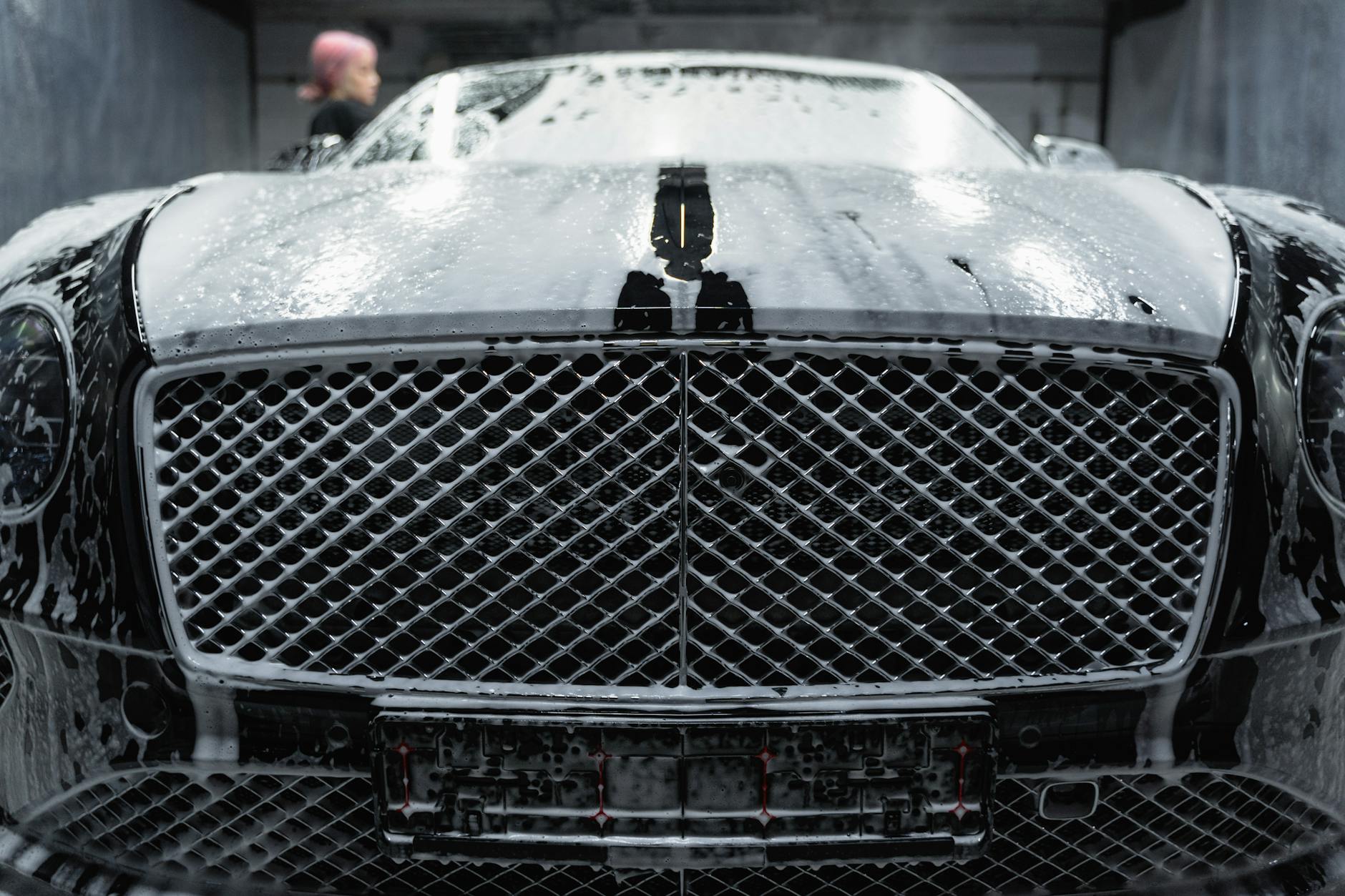 a black car covered with soap